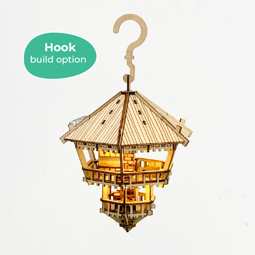Tiny Treehouses 3D Puzzle Wooden birdhouse with a hook build option on a white background