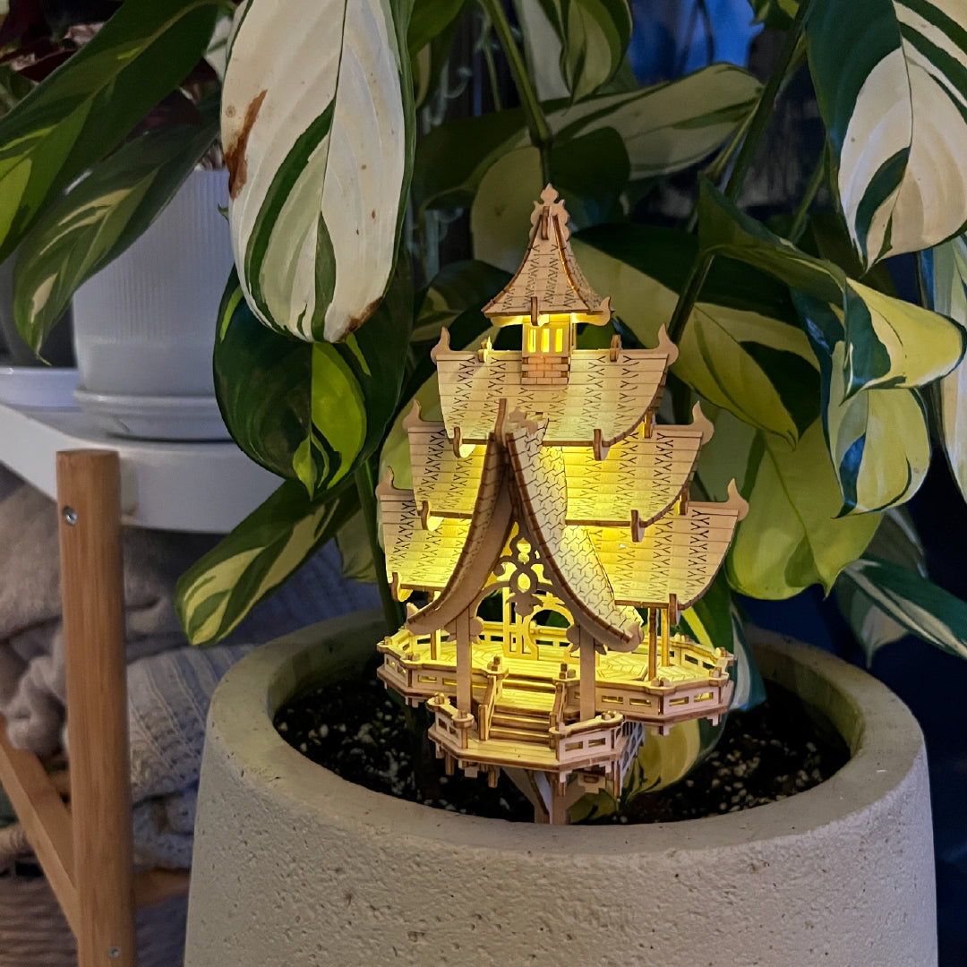 Tiny Treehouses 3D Puzzle Light-up Tiny Treehouse 3D Puzzle miniature pagoda in a potted plant. Lights LED fairy lights wih AAA batteries